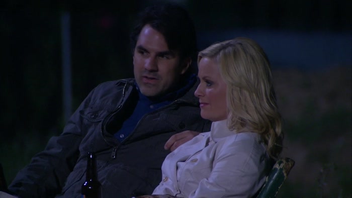 WITH LESLIE REBUFFING MARK'S ADVANCES.  