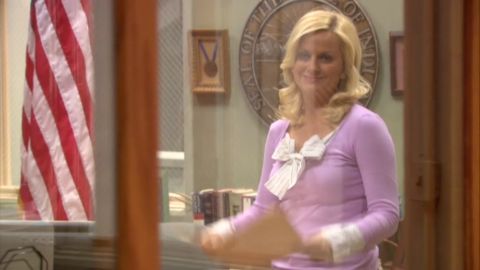 LESLIE AND THE CAMERAMAN HAVE HAD A MOMENT. 