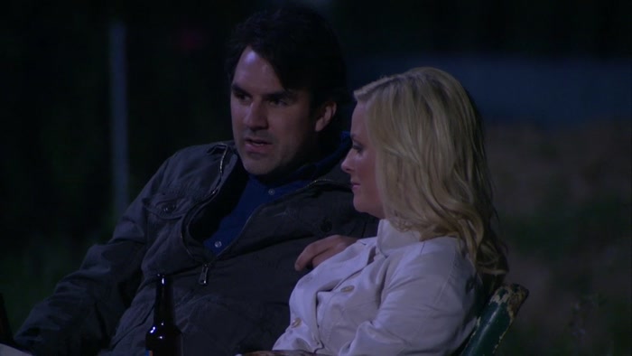 WITH LESLIE REBUFFING MARK'S ADVANCES.  
