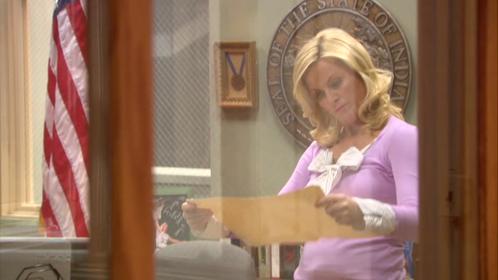 LESLIE AND THE CAMERAMAN HAVE HAD A MOMENT. 