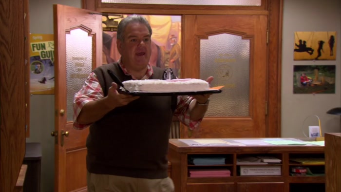 HEY, LESLIE, SOME GUY WHO OWNS A GAY BAR SENT YOU A CAKE. 