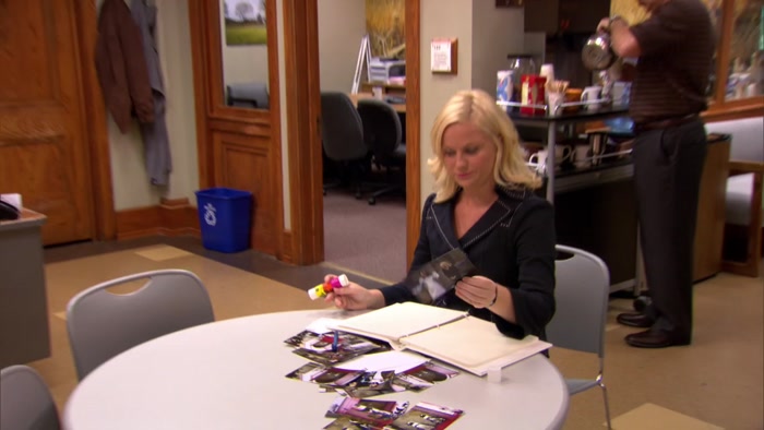 HEY, LESLIE, SOME GUY WHO OWNS A GAY BAR SENT YOU A CAKE. 