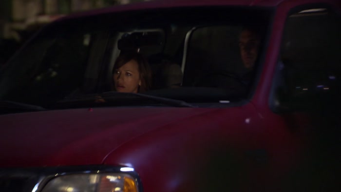 LOOK, THAT GUY'S TRYING TO BREAK INTO THAT VAN. 