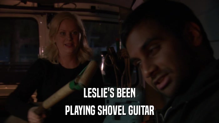 LESLIE'S BEEN PLAYING SHOVEL GUITAR 