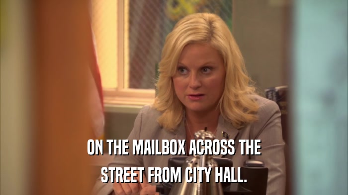 ON THE MAILBOX ACROSS THE STREET FROM CITY HALL. 