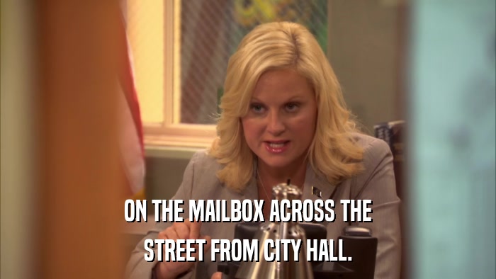 ON THE MAILBOX ACROSS THE STREET FROM CITY HALL. 
