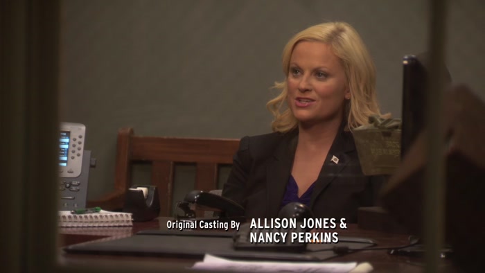 SHE WORKS FOR THE LIBRARY.  
