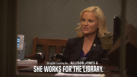 SHE WORKS FOR THE LIBRARY.  