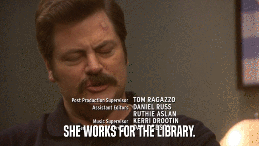 SHE WORKS FOR THE LIBRARY.  