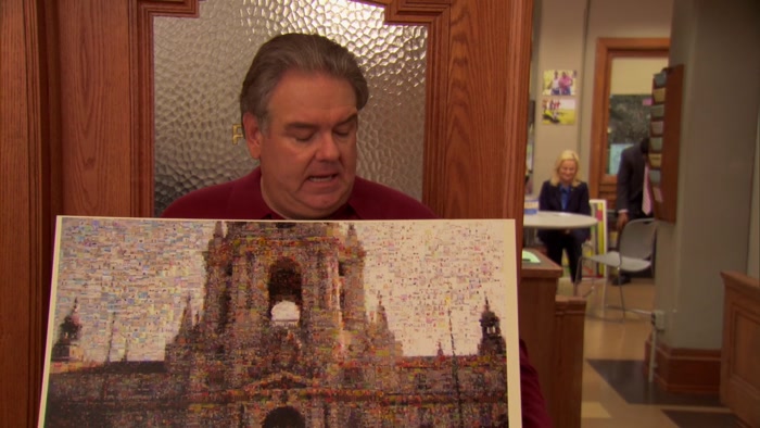 IT'S POINTILLISM. AND EACH DOT IS A PHOTO OF A CITIZEN OF THE TOWN. 