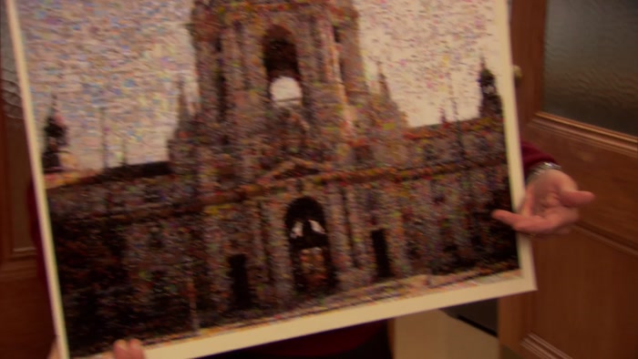 IT'S POINTILLISM. AND EACH DOT IS A PHOTO OF A CITIZEN OF THE TOWN. 