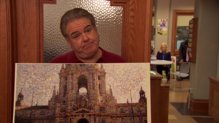 IT'S POINTILLISM. AND EACH DOT IS A PHOTO OF A CITIZEN OF THE TOWN. 