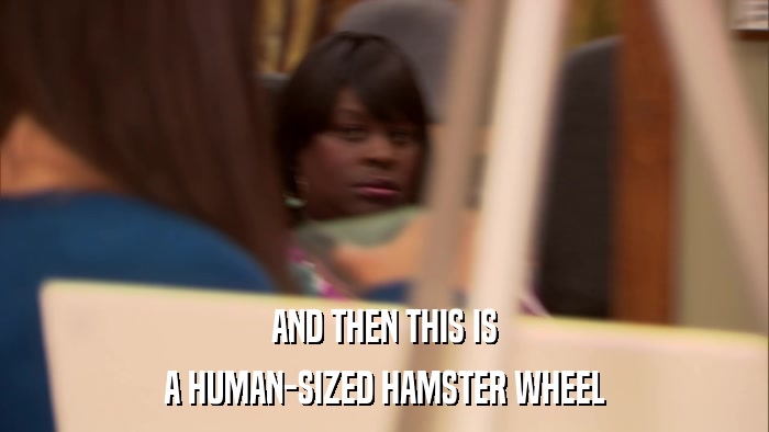 AND THEN THIS IS A HUMAN-SIZED HAMSTER WHEEL 