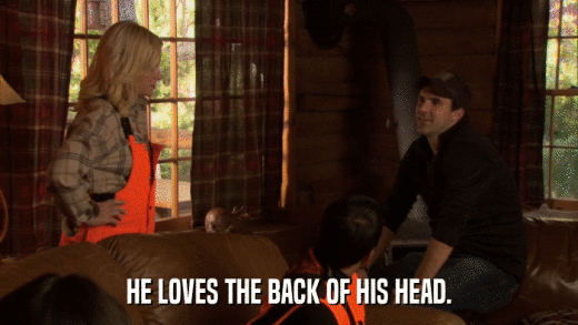 HE LOVES THE BACK OF HIS HEAD.  