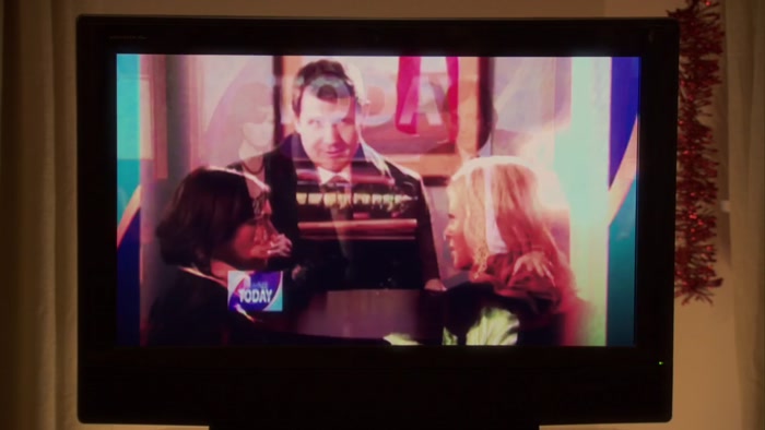 SHE AND KNOPE ARE STANDING VERY CLOSE TO EACH OTHER, 