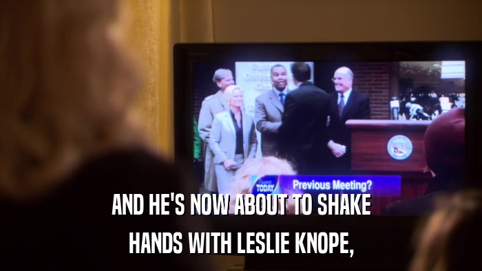 AND HE'S NOW ABOUT TO SHAKE HANDS WITH LESLIE KNOPE, 