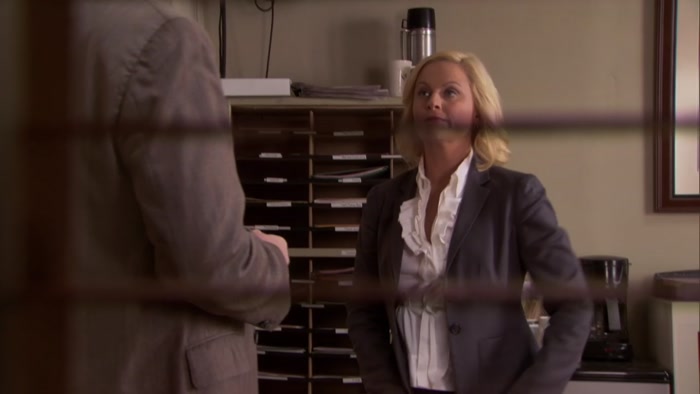 OKAY, LESLIE. WE'VE REACHED OUR DECISION. 