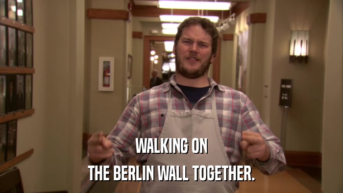 WALKING ON THE BERLIN WALL TOGETHER. 