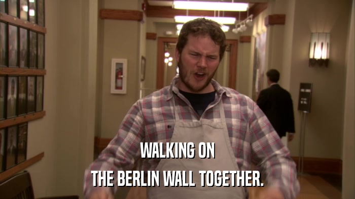 WALKING ON THE BERLIN WALL TOGETHER. 