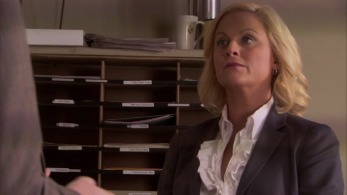 OKAY, LESLIE. WE'VE REACHED OUR DECISION. 