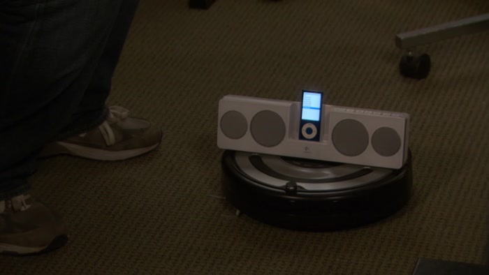 I STRAPPED AN MP3 PLAYER TO ONE OF THOSE FLOOR CLEANING ROBOTS. 