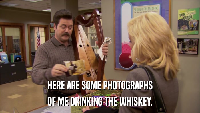 HERE ARE SOME PHOTOGRAPHS OF ME DRINKING THE WHISKEY. 
