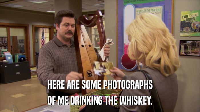 HERE ARE SOME PHOTOGRAPHS OF ME DRINKING THE WHISKEY. 