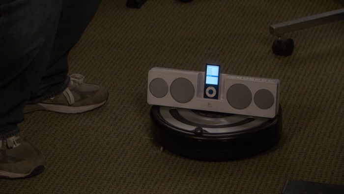 I STRAPPED AN MP3 PLAYER TO ONE OF THOSE FLOOR CLEANING ROBOTS. 