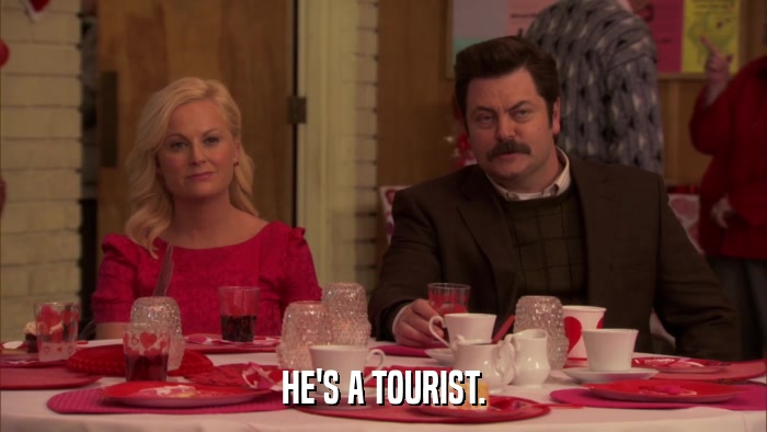 HE'S A TOURIST.  
