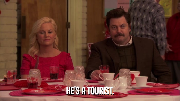 HE'S A TOURIST.  