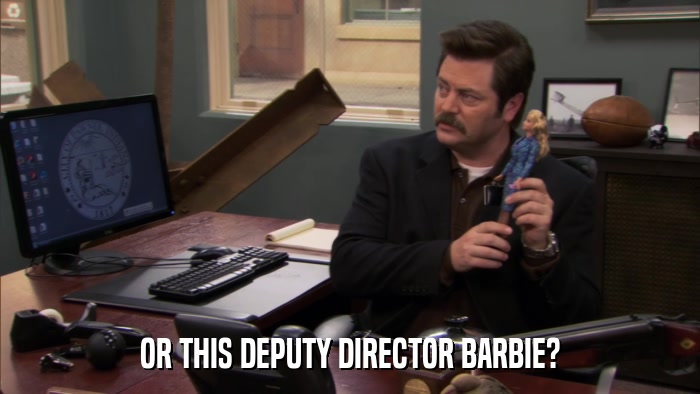 OR THIS DEPUTY DIRECTOR BARBIE?  