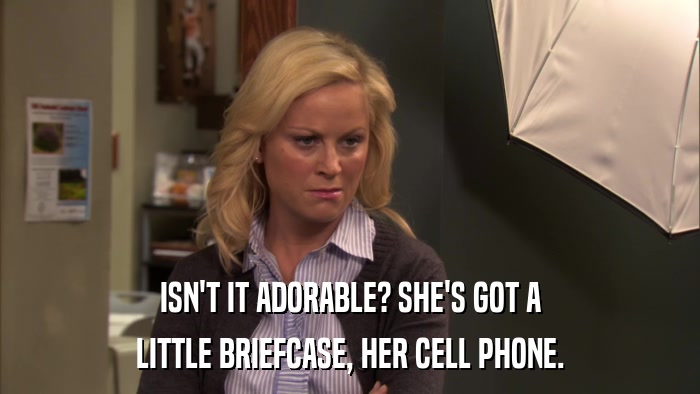 ISN'T IT ADORABLE? SHE'S GOT A LITTLE BRIEFCASE, HER CELL PHONE. 