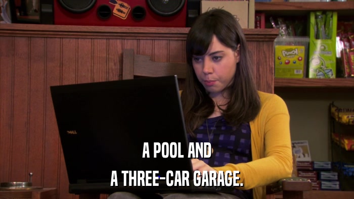 A POOL AND A THREE-CAR GARAGE. 