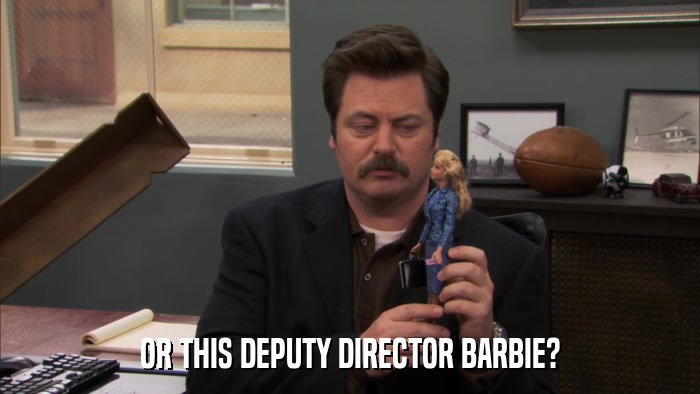 OR THIS DEPUTY DIRECTOR BARBIE?  