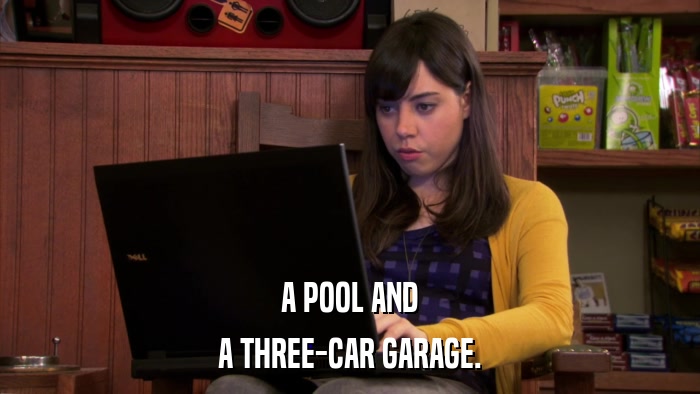 A POOL AND A THREE-CAR GARAGE. 