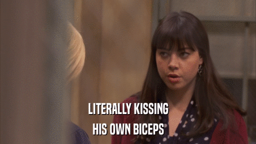 LITERALLY KISSING HIS OWN BICEPS 