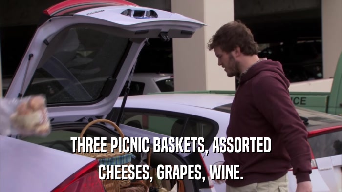 THREE PICNIC BASKETS, ASSORTED CHEESES, GRAPES, WINE. 