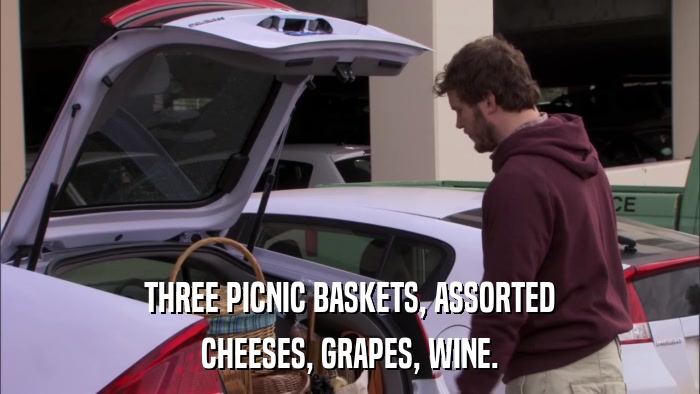 THREE PICNIC BASKETS, ASSORTED CHEESES, GRAPES, WINE. 