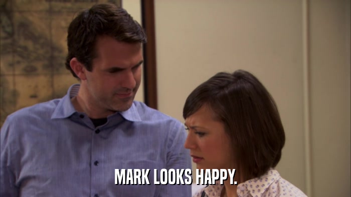 MARK LOOKS HAPPY.  