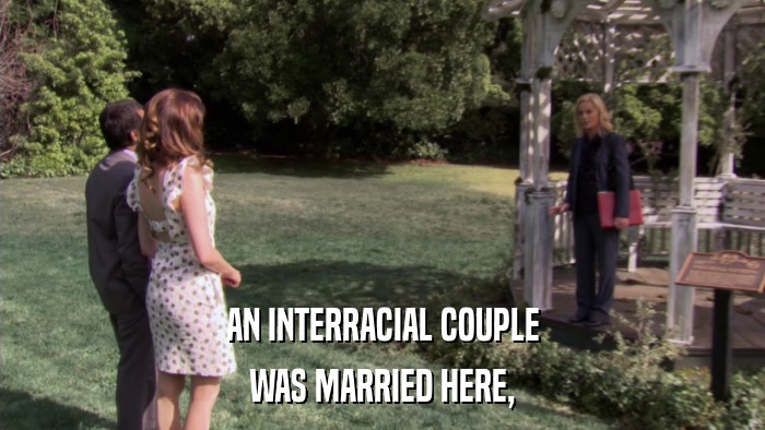 AN INTERRACIAL COUPLE WAS MARRIED HERE, 