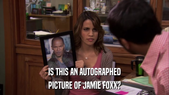 IS THIS AN AUTOGRAPHED PICTURE OF JAMIE FOXX? 