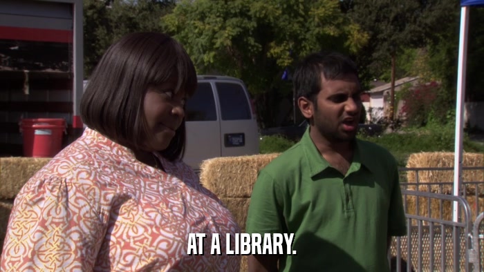 AT A LIBRARY.  
