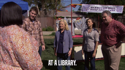 AT A LIBRARY.  