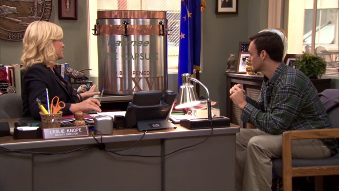 OKAY, KELLY, THIS TIME CAPSULE ISN'T JUST A BARREL FULL OF STUFF THAT PEOPLE LIKE. 