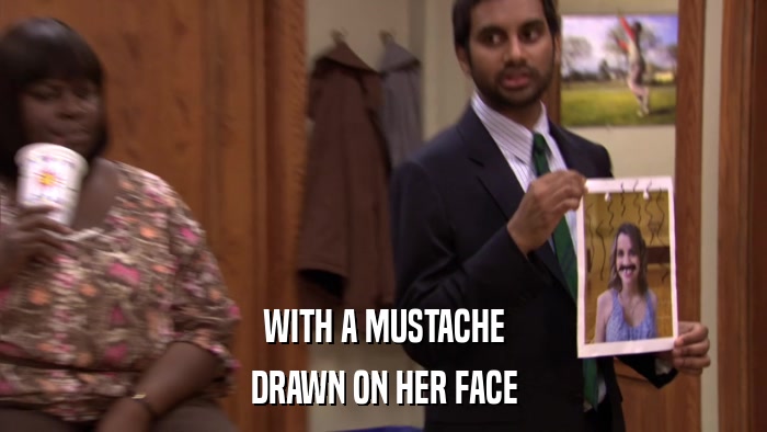 WITH A MUSTACHE DRAWN ON HER FACE 
