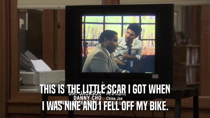 THIS IS THE LITTLE SCAR I GOT WHEN I WAS NINE AND I FELL OFF MY BIKE. 