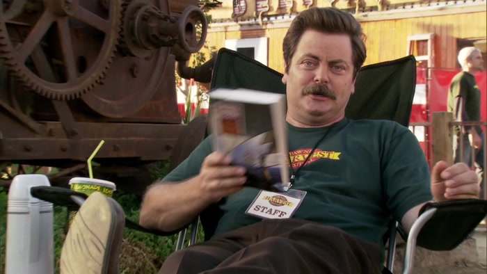 I CAN SIT IN A LAWN CHAIR AND READ THIS BOOK ABOUT OLD BOATS. 