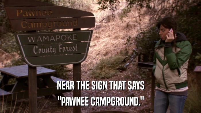 NEAR THE SIGN THAT SAYS 