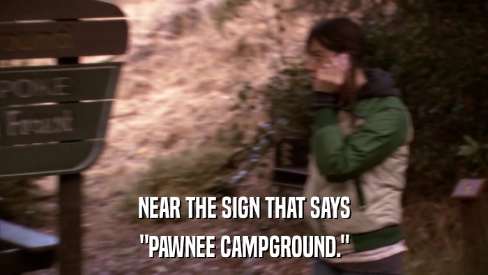 NEAR THE SIGN THAT SAYS 