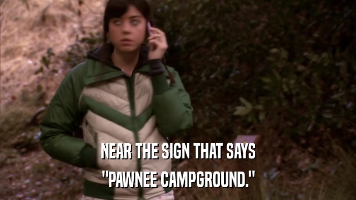 NEAR THE SIGN THAT SAYS 